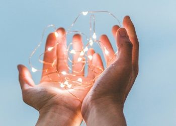 diego ph SZYreZsJ fE unsplash hands hold string lights 400