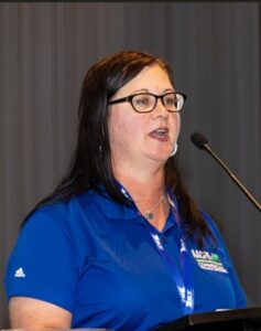 Monitor Most Influential Profile: Carrie Radloff, MBA, CLFP | 2025 Client Champions 1 AACFB Carrie speaking at 300