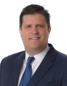 Scott McClain Headshot White Background 2021 Scott McClain 0249 AI EDIT at 400