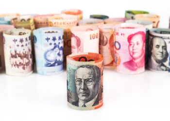 pile of rolled up currency notes with australian d 2023 11 27 05 37 02 utc scaled 1