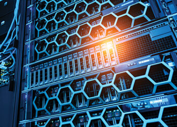 This image showcases a modern server rack within a data center, featuring intricate network equipment and blue LED lighting, highlighting IT infrastructure.